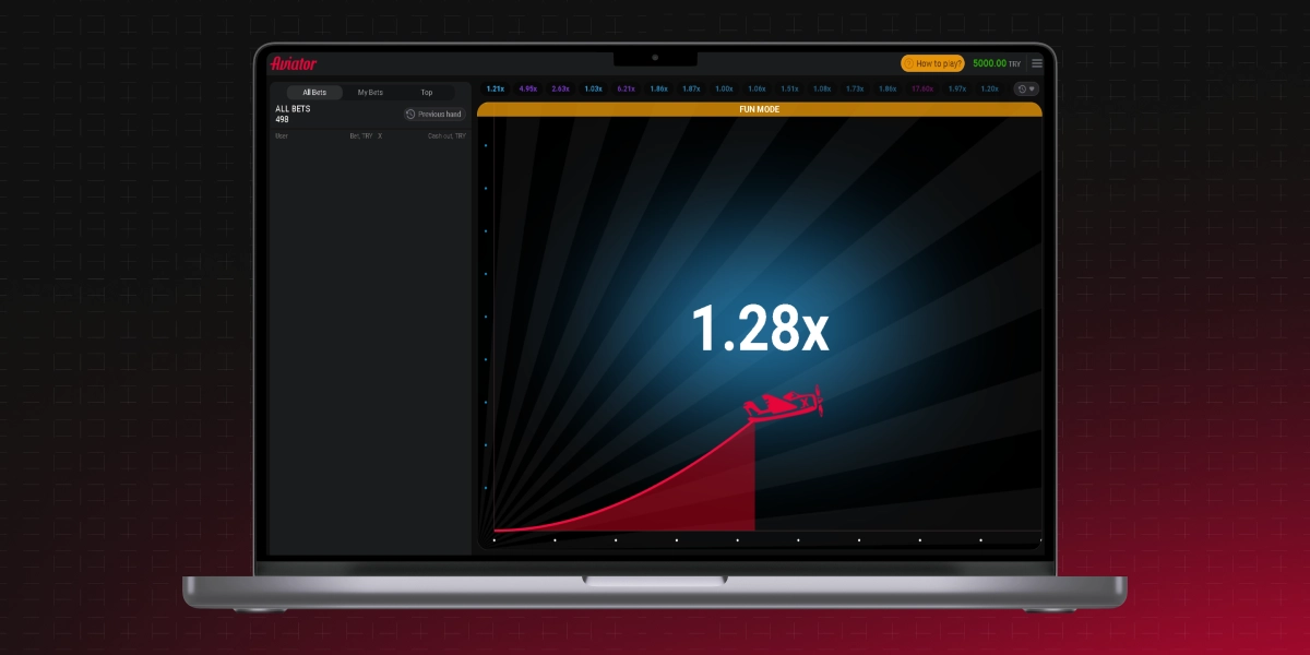 imagem mostra Aviator na tela de um notebook com multiplicador em 1.28x no site da Pixbet
