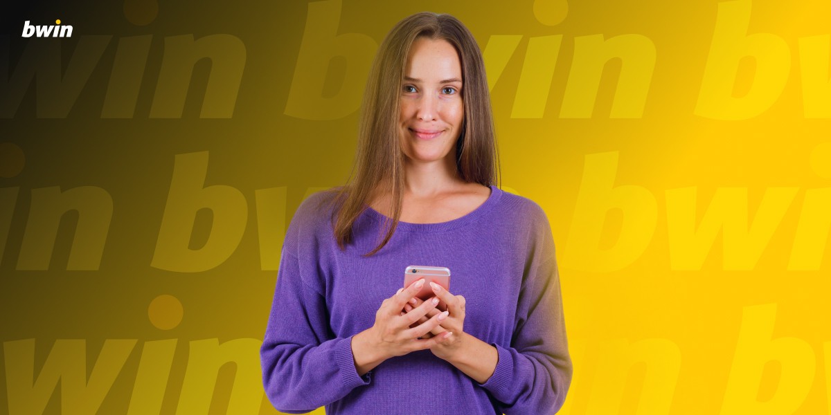 Imagem mostra uma mulher sorrindo ao utilizar um smartphone